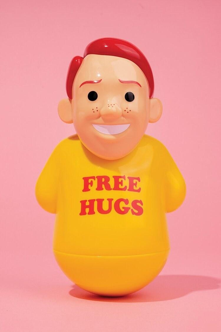 FREE HUGS sculpture by JOAN CORNELLA